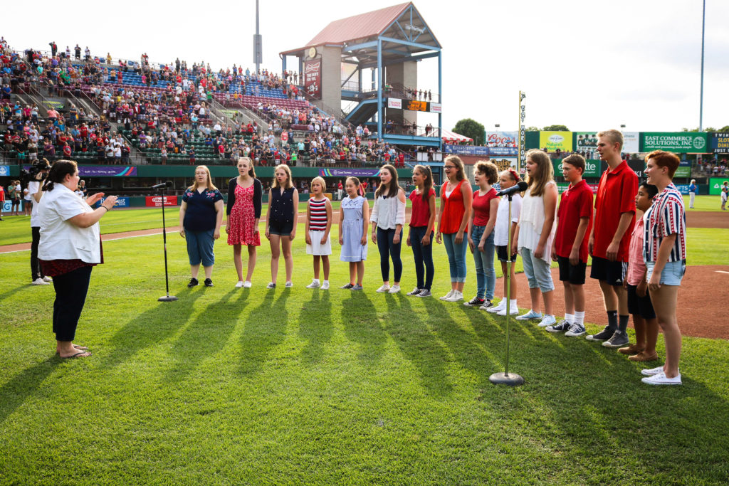 singing at the stadium