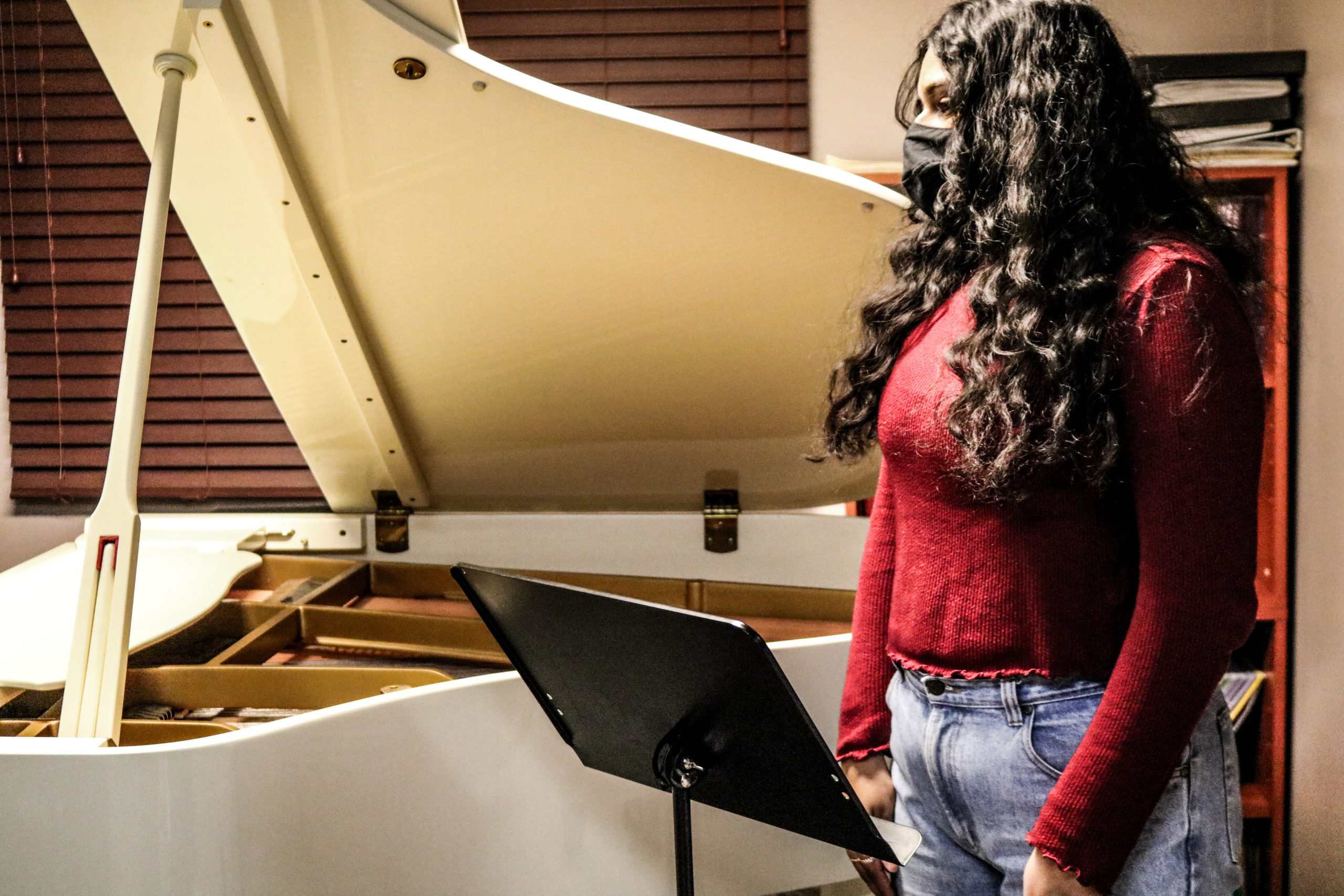 singing in front of piano